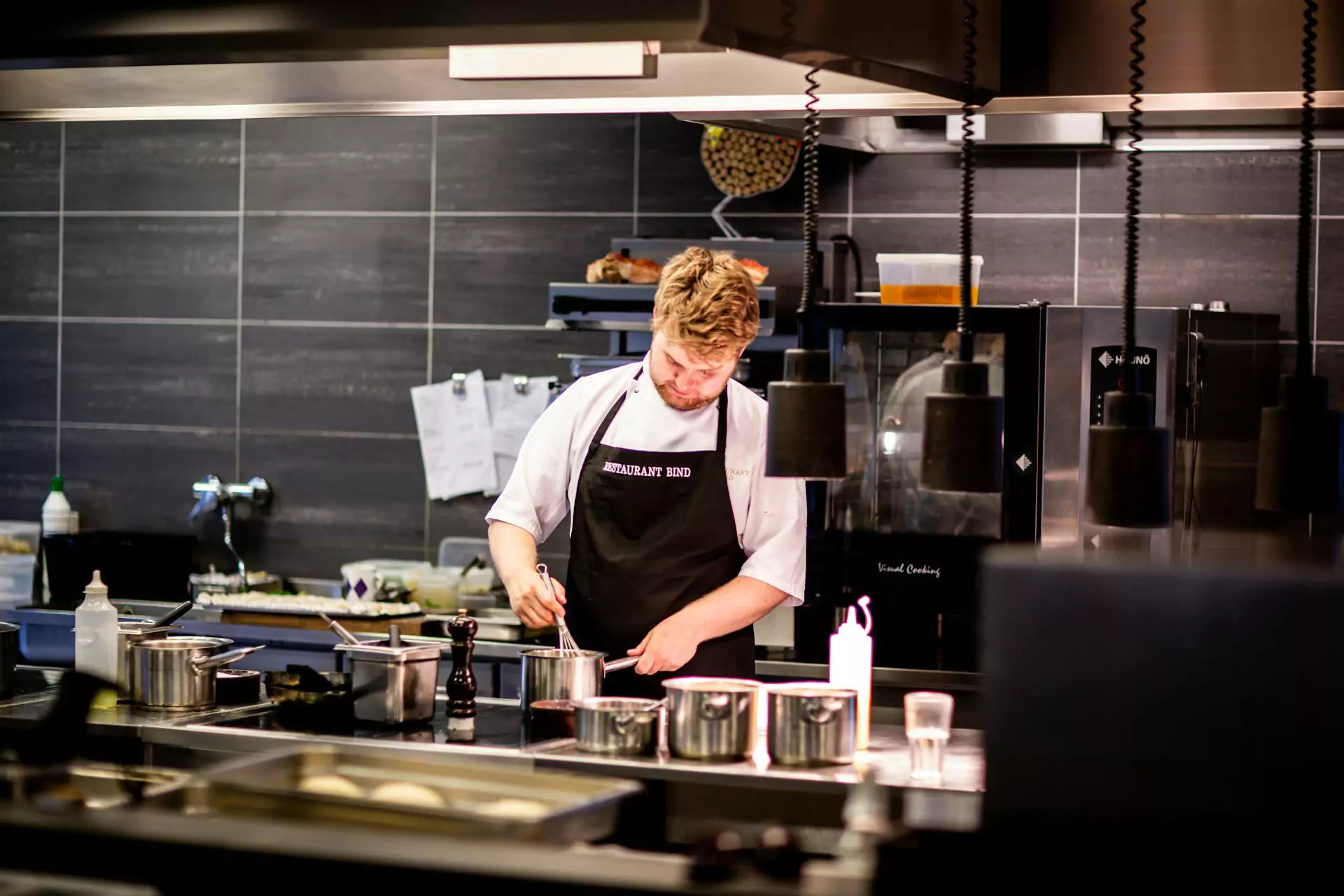 Chef working in restaurant Kirchen