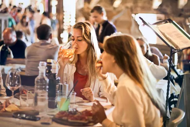 A woman drinking wine