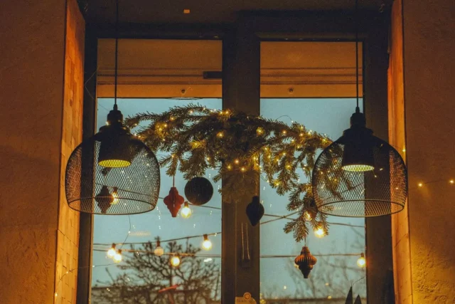 Christmas wreath hanging from restaurant window