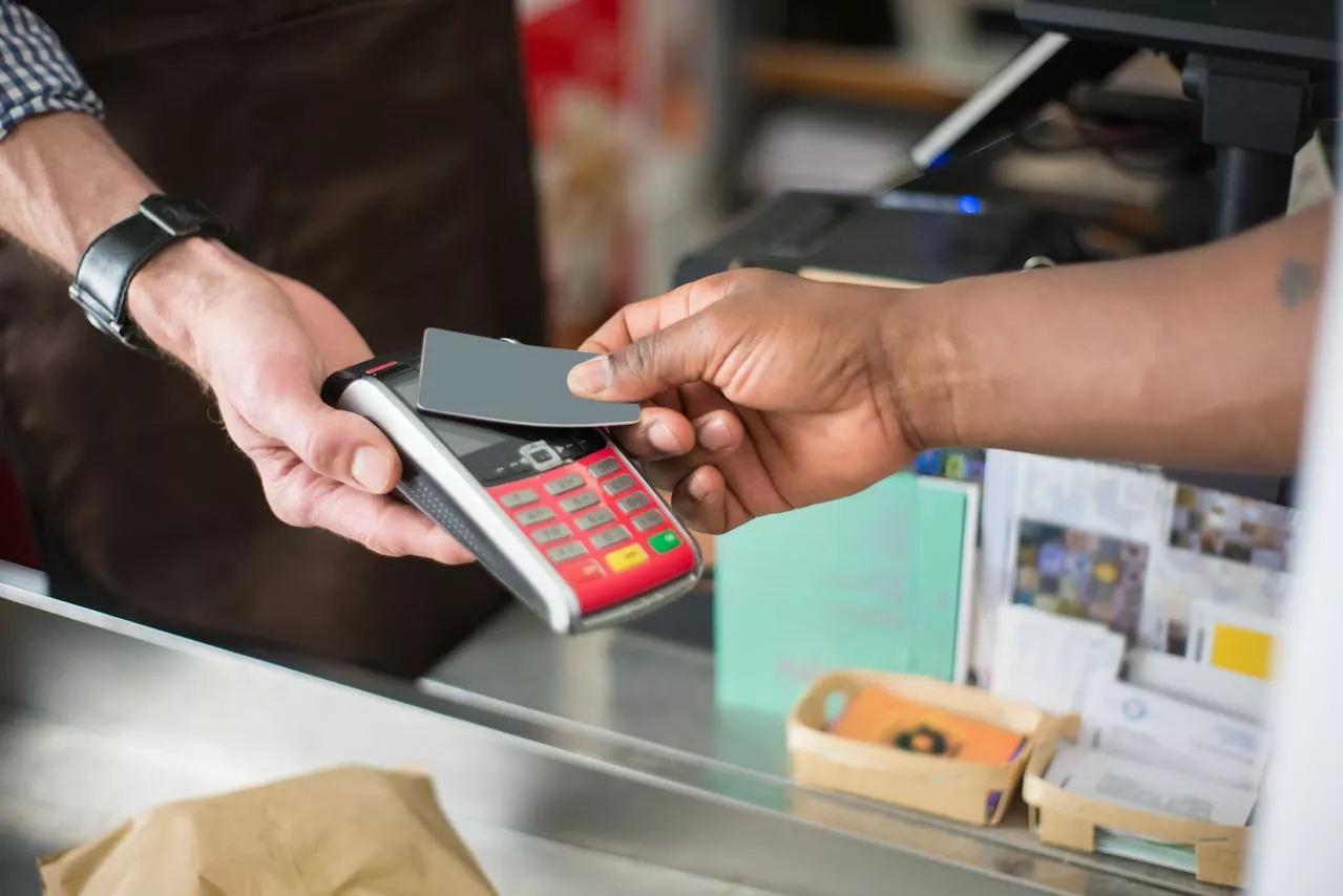 Person paying using a bank card